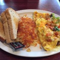 Very Veggie Omelette · 3 egg omelet with spinach, mushrooms, onions, tomatoes,  green peppers and cheese 
