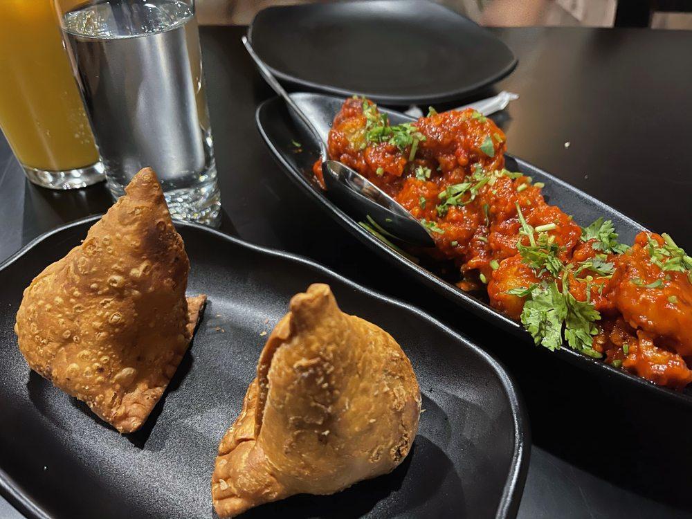 Chicken Samosa · Crispy turnover stuffed with spiced minced chicken.