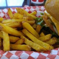 Texas Burger · Onion, pickles, lettuce, tomato, Swiss cheese, jalapeno peppers, mayo and house sauce. Serve...
