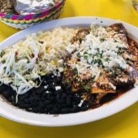 Enchiladas · Choose from enchiladas de mole, salsa verde, or mole rojo. Topped with cheese, onions, and c...