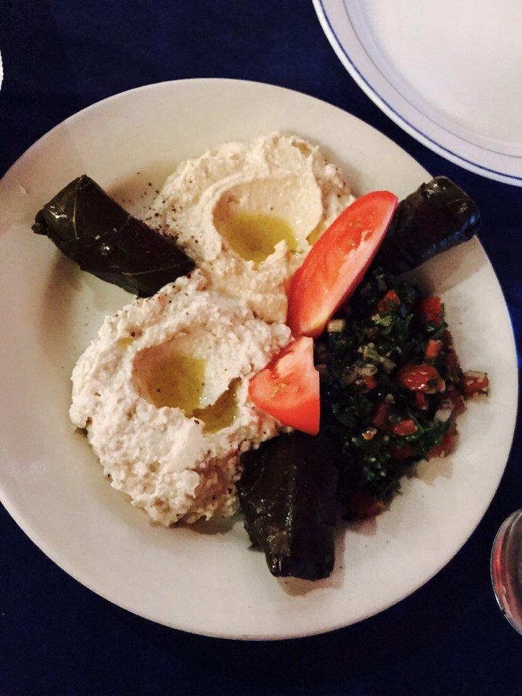 Mazza Plate · Delicious sampler plate of Hummus Dip, Eggplant Dip, Tabouli, and Dolmas. Served with Pita Bread