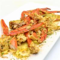 West Garlic Lemon Butter Crab Legs · Includes crab legs seasoned with herbs and spices drizzled with garlic lemon butter.