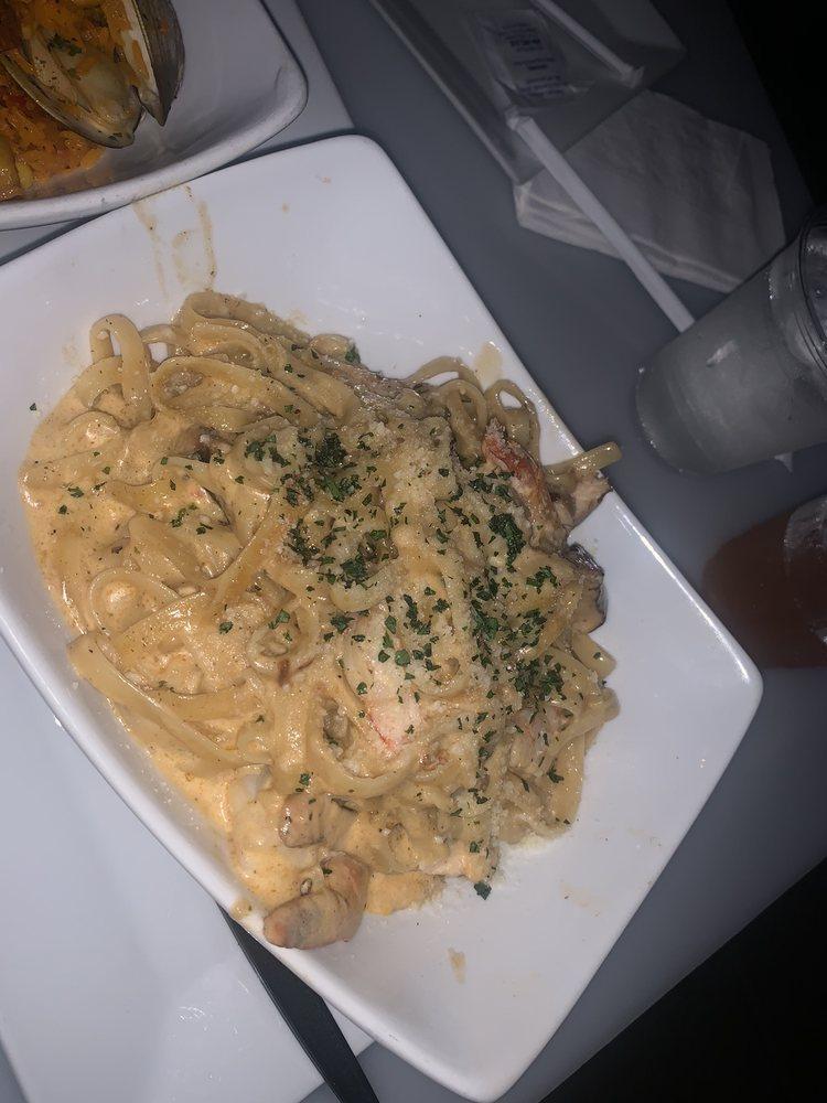 West Signature Pasta · Includes creamy jerk pasta blended with a colorful assortment of bell peppers served with grilled chicken or shrimp.