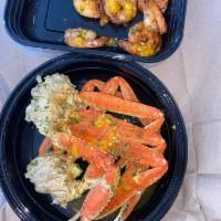 Grilled Shrimp · Includes jumbo shrimp seasoned and grilled dressed with fresh cherry tomato and garlic butter.