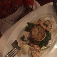 Mini Surf and Turf · 4 oz. filet mignon, one crab cake and a jumbo gulf shrimp. Served with fresh sauteed spinach...