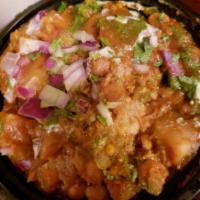 Samosa Chaat · Homemade Indian potato patties stuffed with vegetable, chana, yogurt, green, mint chutney, r...