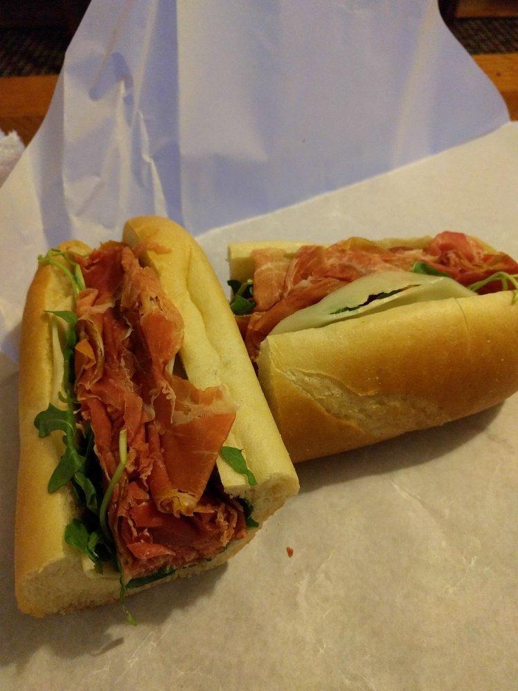 Figgy Piggy Sandwich · Prosciutto, provolone cheese, fig jam, arugula and extra virgin olive oil.