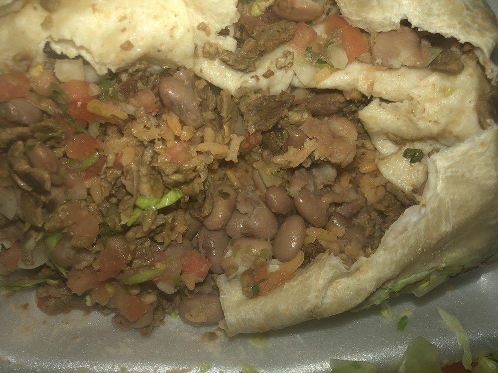 Super Burrito · Rice, beans, cheese, sour cream, guacamole, and Mexican salsa.