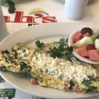 Greek Omelette · Spinach, tomatoes, bell peppers, black olives and feta cheese.