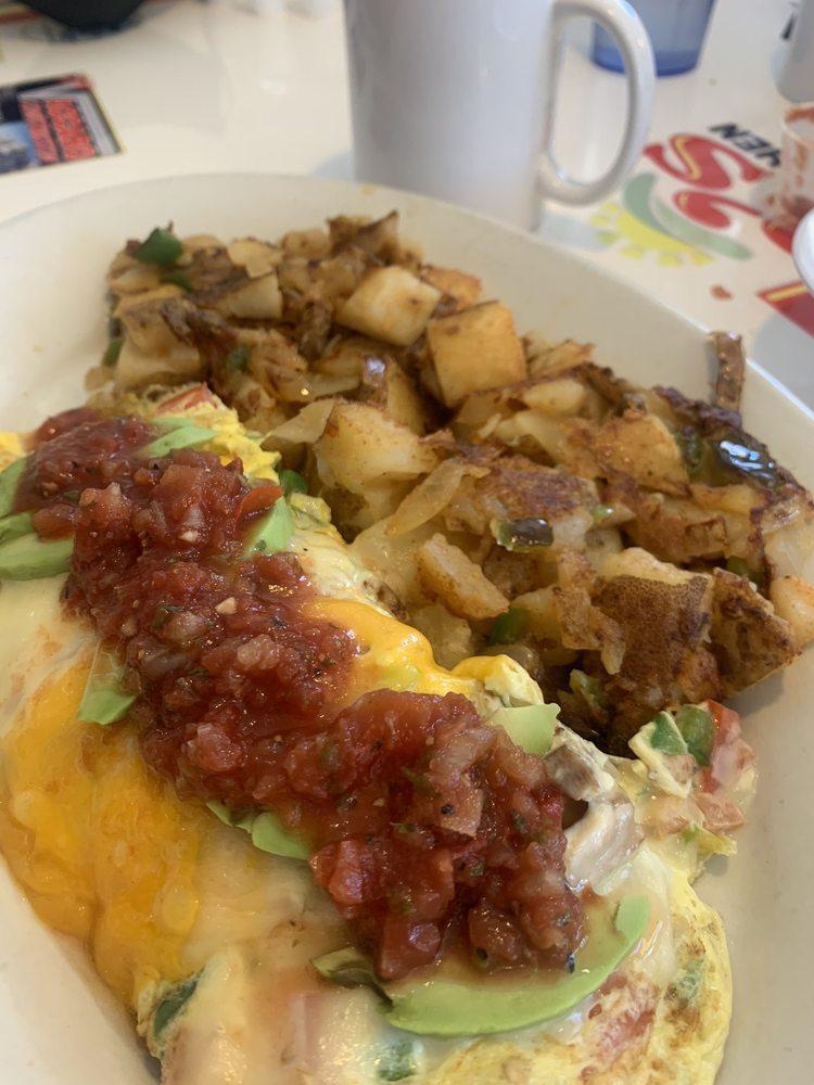 Veggie Omelette · Sautéed mushrooms, onions, bell peppers, tomatoes, spinach ​and avocado. Topped with cheddar and jack cheese.