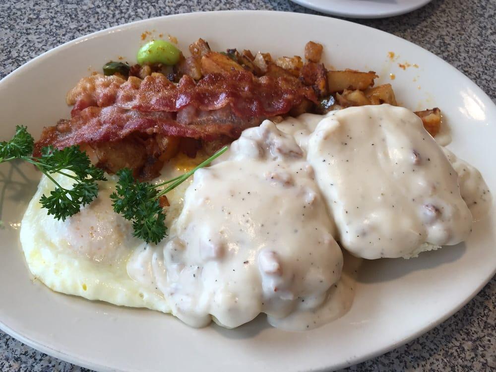 Combo Breakfast · Our homemade biscuit topped with our delicious sausage gravy, served with two eggs* any style and choice of 