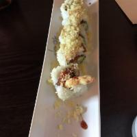 Crunchy Roll · Inside: shrimp tempura, crab meat avocado and cucumber. Top: crunchy flakes.