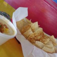 Chips and Queso · Basket of fresh tortilla chips seasoned with Fuzzy Dust and served with queso.