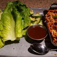 Chicken Lettuce Wraps · Chicken breast, water chestnuts, peanuts, carrots, sesame soy sauce, pickled cucumbers, roma...