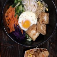 Bi Bim Bop Mixed Rice Bowl · Assorted veggies on rice topped with a fried egg. Choose beef, chicken, pork or tofu. Comes ...