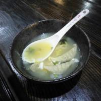 Dumpling Soup · Soft rice cakes, dumplings, and egg in a light broth.