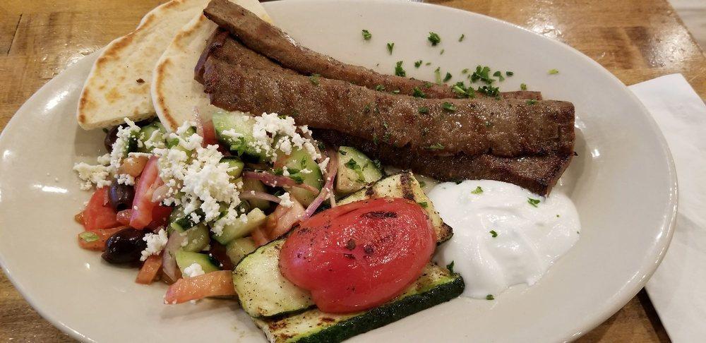 Gyros Platter · Mixed beef and lamb, tzatziki, grilled vegetables, horiatiki salad, pita.