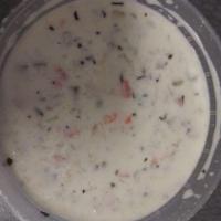 New England Clam Chowder · A hearty clam chowder full of clams, potatoes, and sauteed veggies in a rich cream base.