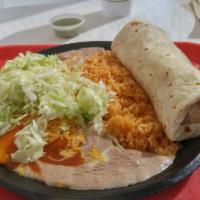Cheese Enchiladas · Two corn cheese enchiladas smothered in red enchilada sauce with cheese and lettuce on top. ...