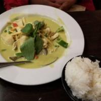 Green Curry · Coconut milk with bell pepper, bamboo shoot, egg plant, peas, carrots and basil in green cur...