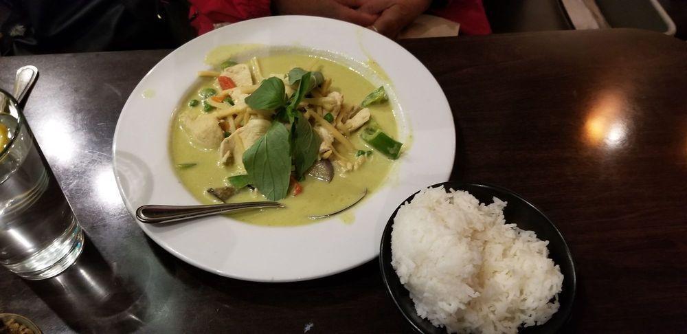 Green Curry · Coconut milk with bell pepper, bamboo shoot, egg plant, peas, carrots and basil in green curry paste.