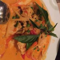 Red Curry · Coconut milk with bell pepper, bamboo shoot, egg plant, peas, carrots and basil in red curry...