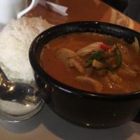 Red Curry · Red curry paste, coconut milk, bell peppers, bamboo shoots and basil leaves. Comes with choi...