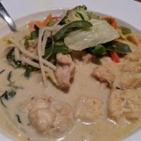 Green Curry · Green curry paste, coconut milk, bell peppers, bamboo shoots and basil leaves. Comes with ch...