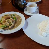Green Curry · Stir fried asparagus, peapods, bamboo and yellow onions. Served with steamed jasmine white r...