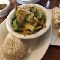Yellow Curry · Stir fried potato, green bell peppers, bamboo shoots, carrots and yellow onions all simmerri...