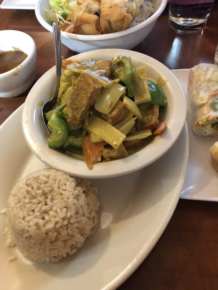 Yellow Curry · Stir fried potato, green bell peppers, bamboo shoots, carrots and yellow onions all simmerring in a Thai yellow curry sauce. Served with steamed jasmine white rice. Gluten-free, spicy, vegan and vegetarian.