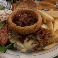 Western Burger · Topped with melted pepper jack cheese, BBQ sauce, bacon, fried onion and onion ring.