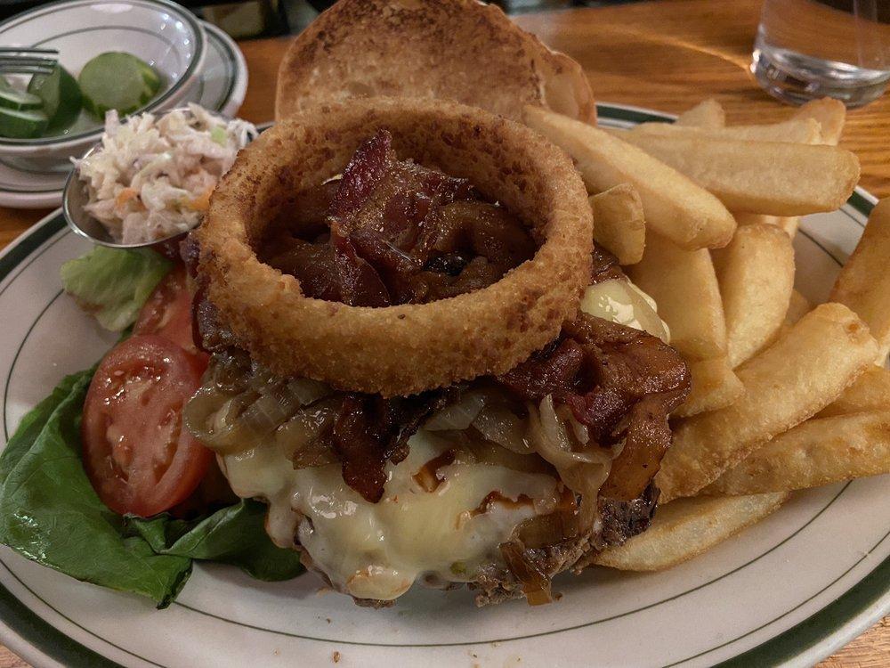 Western Burger · Topped with melted pepper jack cheese, BBQ sauce, bacon, fried onion and onion ring.