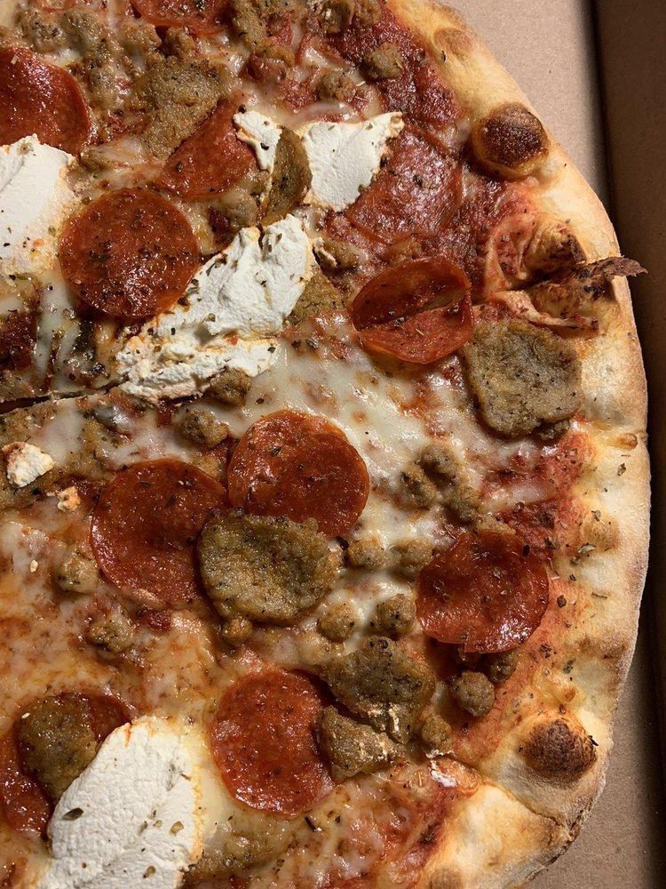 The New Yorker Pizza · Pepperoni, Italian sausage, fresh garlic, oregano, ricotta and mozzarella.