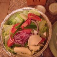 Garden Salad · Romaine lettuce, tomato, red onion, pepper, mushrooms and mozzarella.