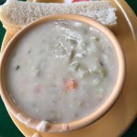 New England Clam Chowder · Classic East Coast style with tasty clams.