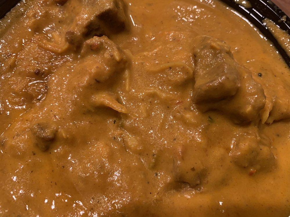 Lamb Korma · Boneless lamb cubes cooked with coconut, cashew, raisin, and Himalayan sauce.
