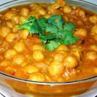 Chana Masala Curry · Chickpeas cooked with special herbs and spices in Himalayan gravy sauce.