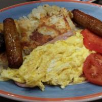 Irish Breakfast · Two eggs with Irish bacon, Irish sausage, black and white pudding and grilled tomato.Served ...