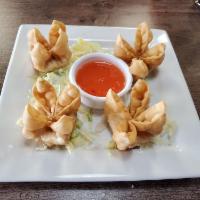 4 Crab Rangoons · Imitation crab meat, garlic, and cream cheese. Served with plum sauce.