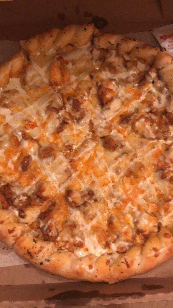 Buffalo Chicken Pizza · Chopped boneless wings, wing sauce, onion and cheddar cheese.