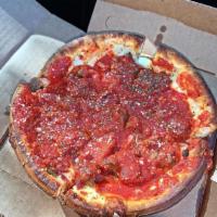 Carnivore Classic Pizza · Sausage, pepperoni, meatball, bacon.