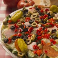 Aurelio's Italian Antipasto Salad · Fresh and crisp iceberg and romaine lettuce topped with ham, mozzarella cheese, pepperoni, g...