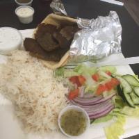 Gyro Plate · Served with salad, rice, pita bread and tzatziki sauce.