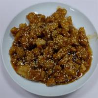 Sesame Chicken · Tender fried chicken sauteed in Szechuan sauce with sesame seeds. Spicy.