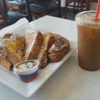 French Toast · Three slices of Portuguese bread.