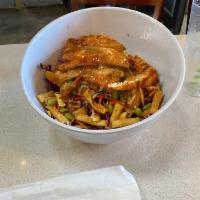 Chinese Chicken Salad · Shredded iceberg lettuce, red cabbage, wonton chips, carrots, cucumbers, edamame, scallions ...