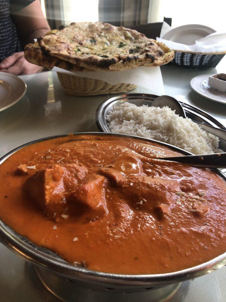 Butter Chicken · Boneless pieces of chicken coocked in the tandoor, then cooked to perfection in a tomato gravy cream.