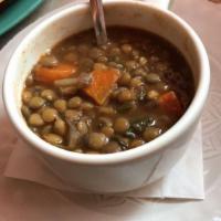 Lentil Soup Lunch · Tomato-based vegetarian soup made with carrots, onions, spinach, and lentils.