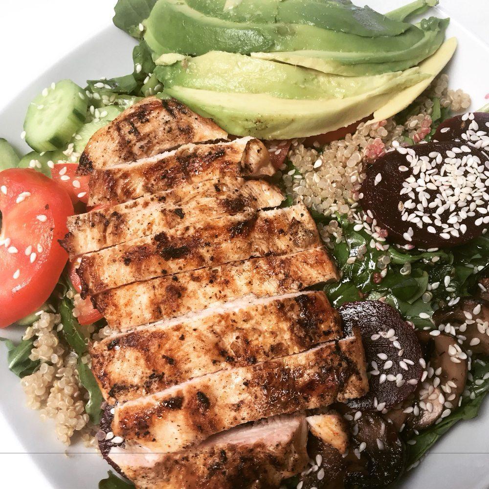 Wellness Chicken Salad · Grilled chicken breast, organic baby arugula,lettuce quinoa, mushrooms, cucumbers, beets, tomatoes, avocado and sesame seeds with chimichurri vinaigrette.